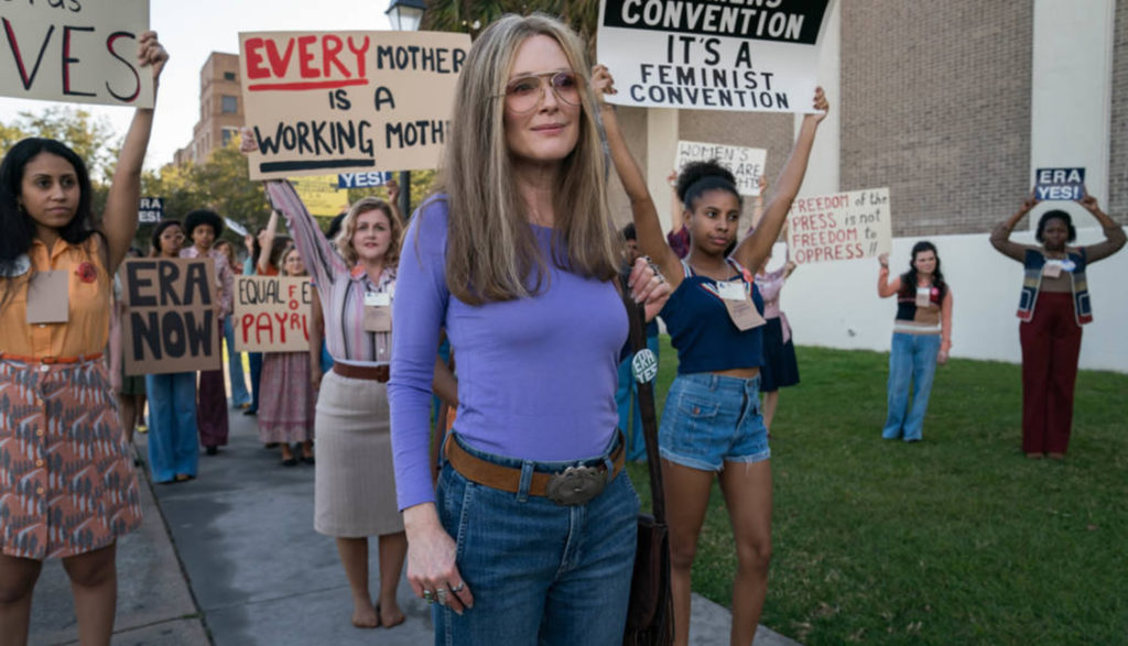 Actress Julianne Moore as Gloria Steinem at a women's rights rally.