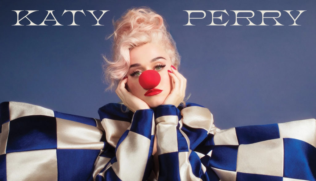 Katy Perry as a frowning clown on the album cover of "Smile"