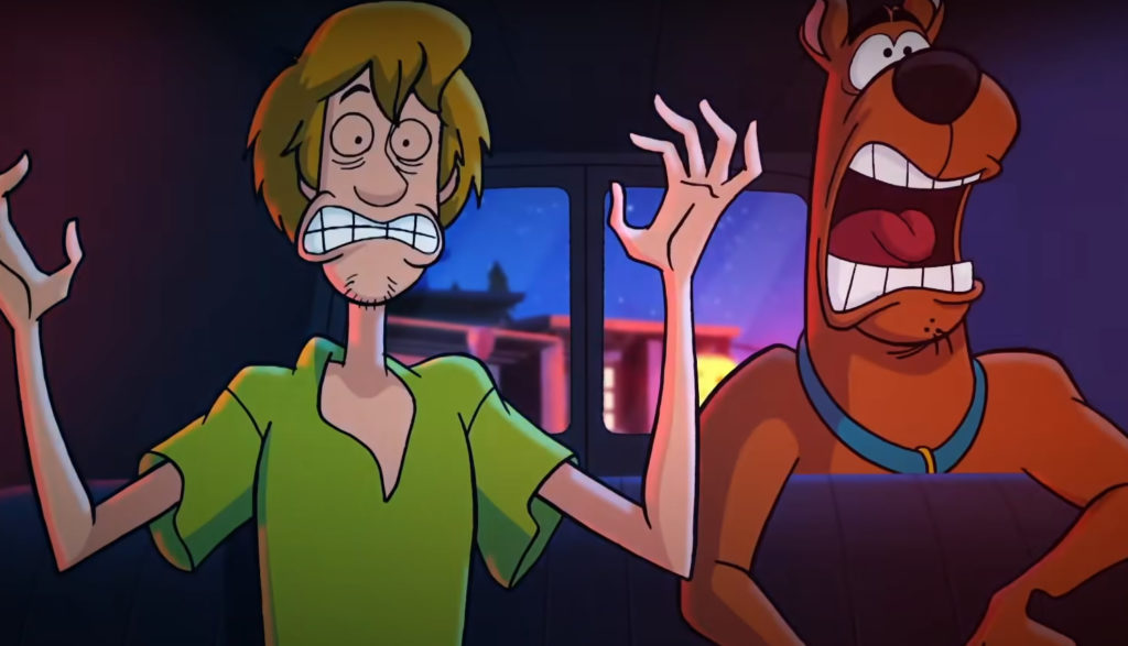 Shaggy and Scooby-Doo freak out in fear.