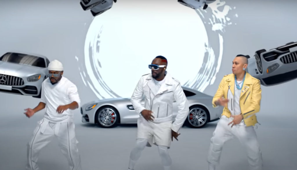 Screen capture of three black men dancing in Black Eyed Peas video for "Girl Like Me."