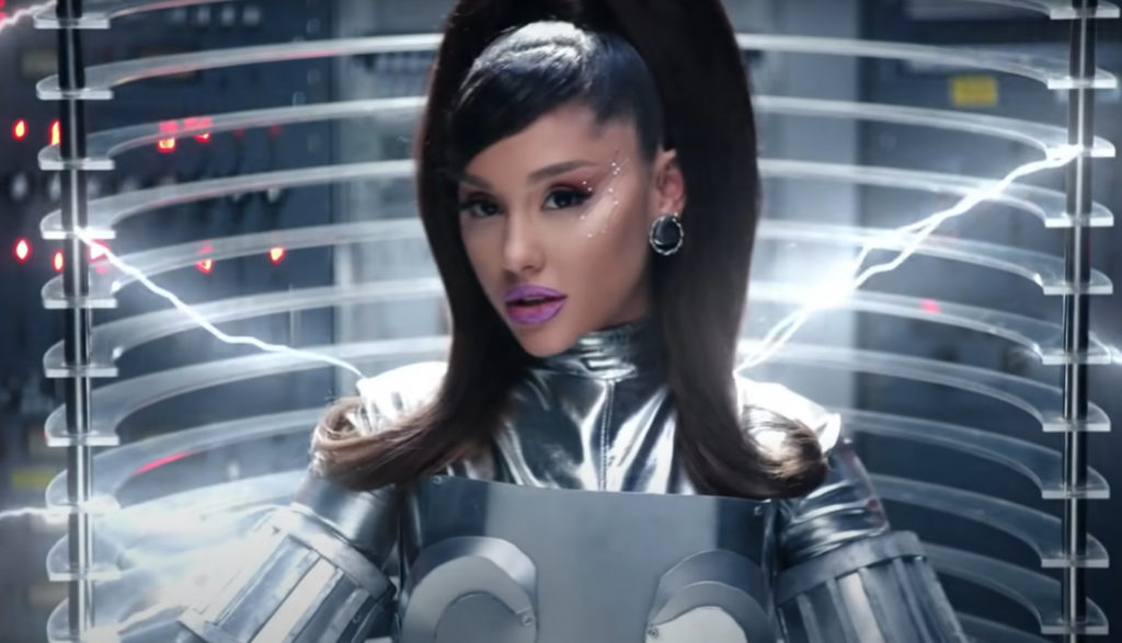 Singer Ariana Grande dresses up as a robot coming to life in the video for her song "34+35."