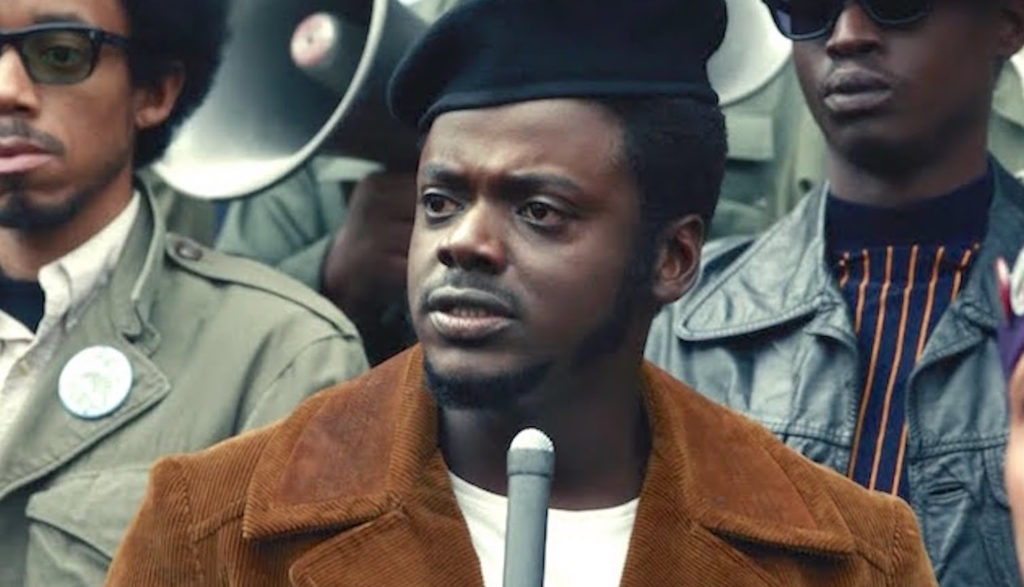 Still image of a black man speaking in the movie "Judas and the Black Messiah."
