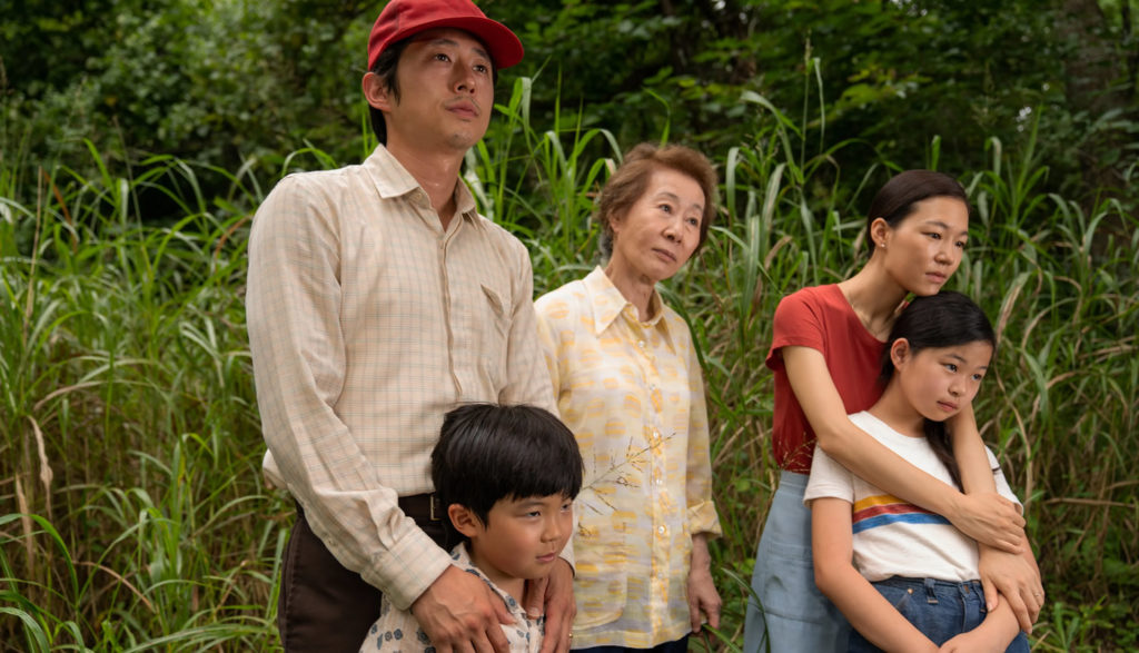 This picture of a Korean-American family includes mom, dad, two kids and grandma.