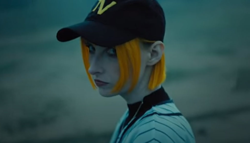 A close-up shot of angry Tessa Violet in the video for her song "Games."
