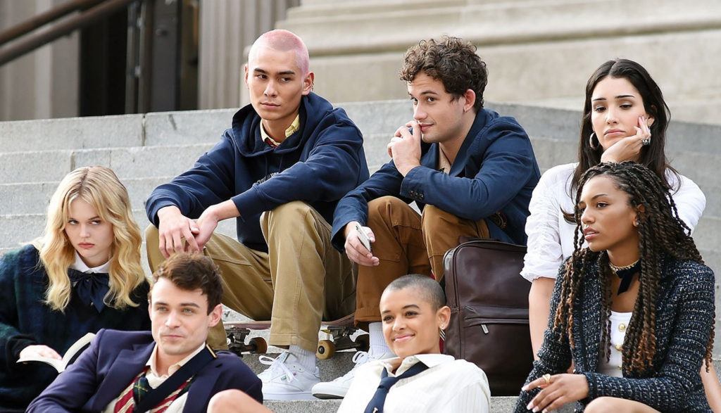 Teens sit on the stairs of the MET