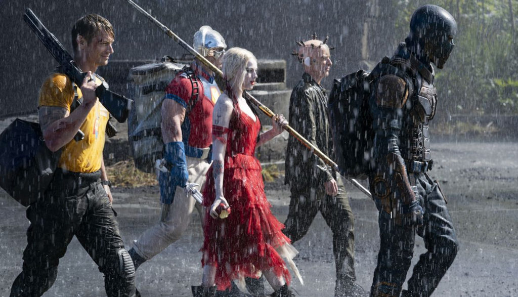 members of the suicide squad walking through the rain