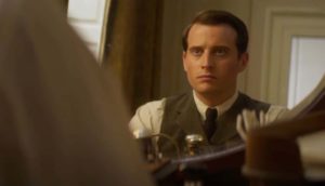 blog top 11-26 a man looking into a mirror in The Most Reluctant Convert movie
