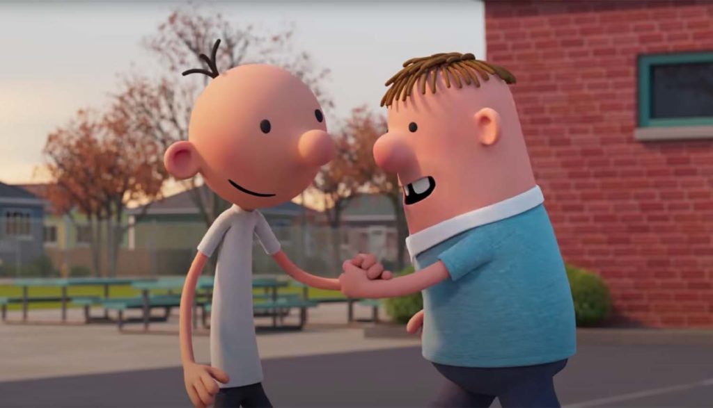 two boys shaking hands in Diary of a Wimpy Kid movie
