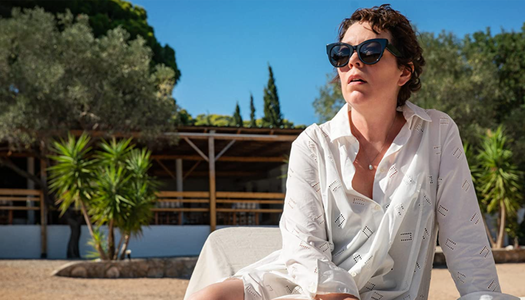 woman on a beach in The Lost Daughter movie