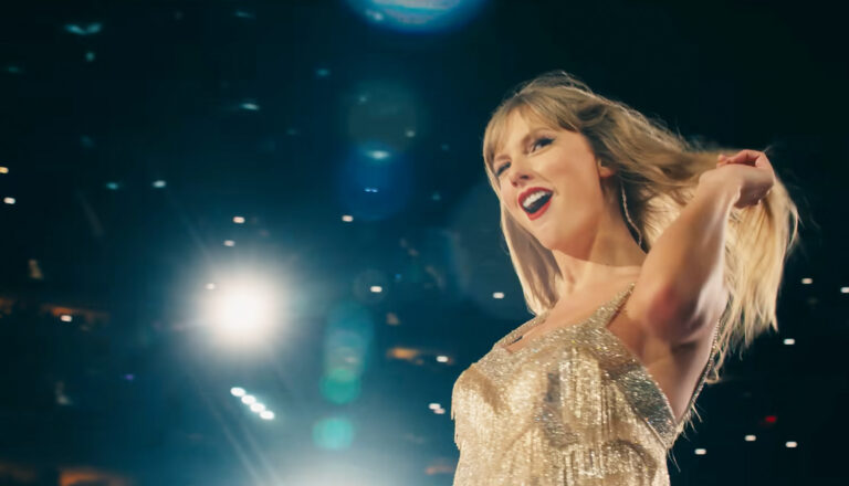 jim carrey christmas carol ghost of christmas future Taylor Swift The Eras Tour 2023