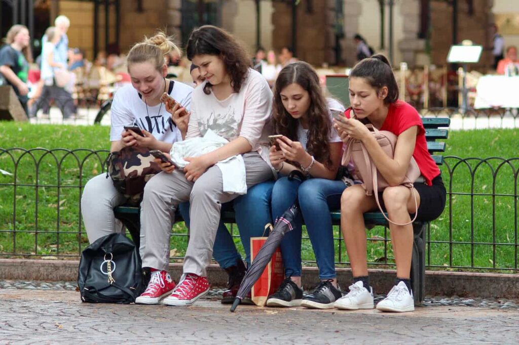 group of girls on phones